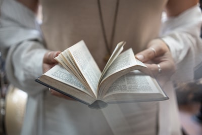 Hold the book for coke photography
